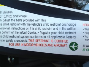 FAA sticker on a car seat (will ALWAYS be in RED)