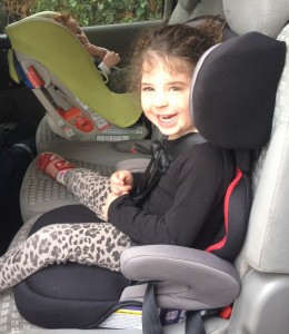 TheCarSeatLady Emilys 4-year-old daughter in the Go and 1.5 year-old son in a Combi Coccoro in a rental car in Europe